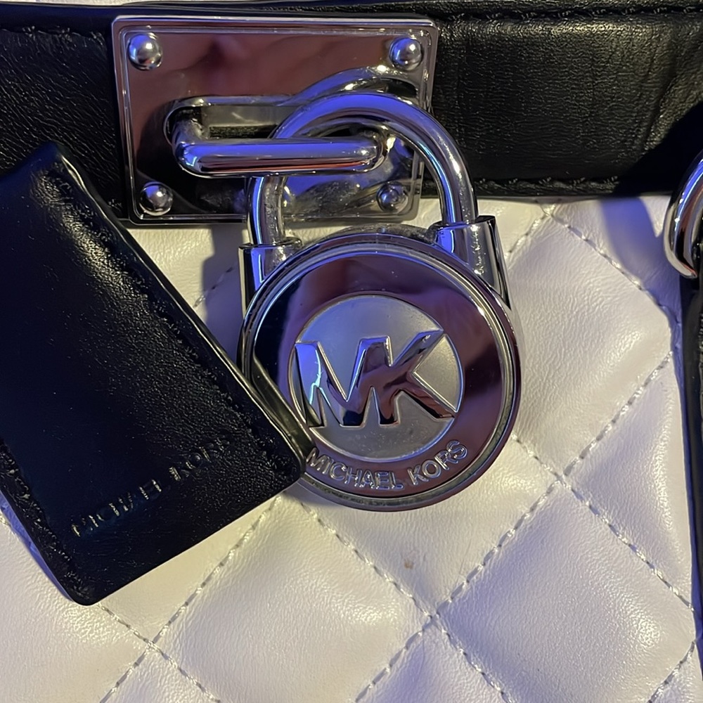 Michael Kors. Purse used normal wear non-smoking home.
